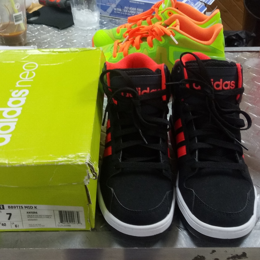 adidas size 7  brand new in box. blk & €Orange NIB